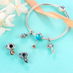 S925 sterling silver charm bracelet with hot air balloon, teapot and trophy pendants