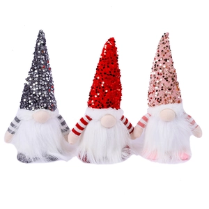 Three sequined Christmas gnomes with glowing hats and white plush beards for home decor