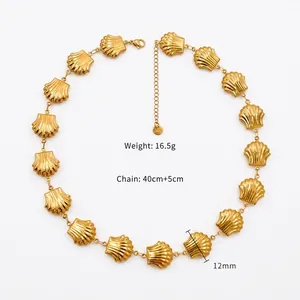 Detail view of a gold shell necklace with a 40+5cm adjustable chain and lobster clasp