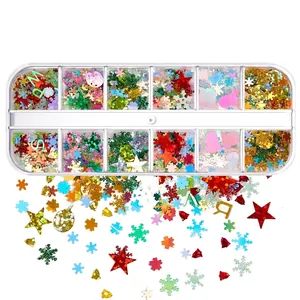Detailed view of 12-grid Christmas nail art sequins with snowflake and tree shapes