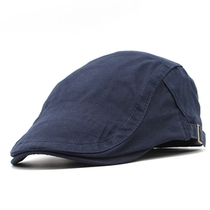 Detail view of cotton flat cap in navy blue featuring adjustable side metal buckles