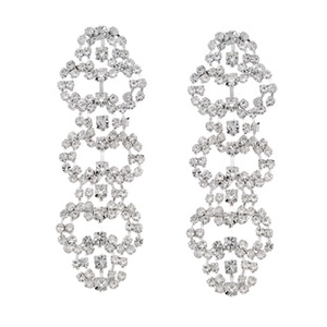Close-up of luxury rhinestone feather drop earrings with silver fringe for bridal events