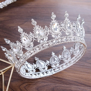 Macro shot of silver bridal crown featuring brilliant clear crystals and rhinestone details