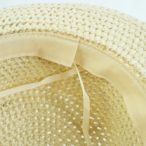 Close-up of internal sweatband and adjustable drawstring on British straw hat