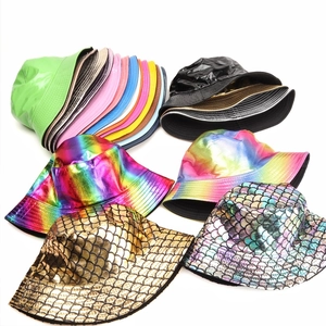 Stack of shiny metallic and colorful faux leather bucket hats with various glossy textures