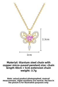 Detail of butterfly necklace with pink heart stone and teardrop zirconia pendant