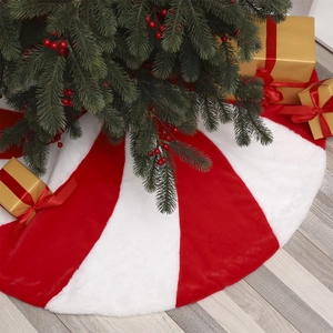 Red and white striped plush Christmas tree skirt on wooden floor with gift boxes