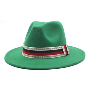 Detail of green wool fedora hat featuring a patterned tricolor striped ribbon band