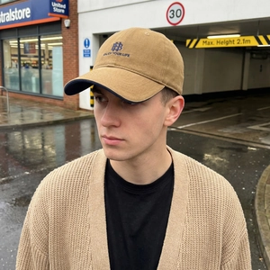 Retro khaki cotton baseball cap featuring navy blue HB embroidery in a street style