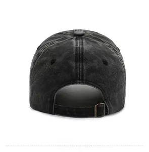 Close-up of washed gray baseball cap back showing adjustable metal buckle and cotton texture