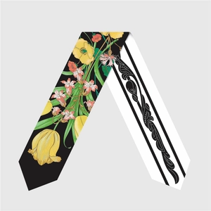 Floral print silk neck scarf with botanical motifs and geometric pattern on reverse side