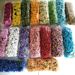 Macro shot of colorful artificial flower stamens for DIY crafts and gift box decor
