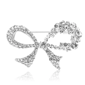 Elegant silver bow brooch with sparkling clear rhinestones for women's suits and coats