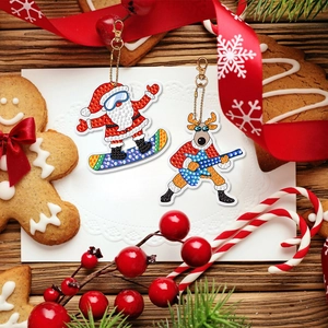 DIY Christmas diamond painting keychains featuring Santa and reindeer on a festive background