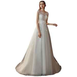 Elegant white lace A-line bridal wedding gown with illusion neckline and long train