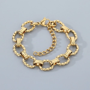 Detail of gold-plated stainless steel cable chain bracelet with lobster clasp and extender