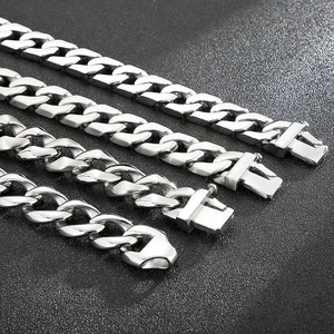 Detailed macro view showing four widths of polished steel cuban link bracelets for men