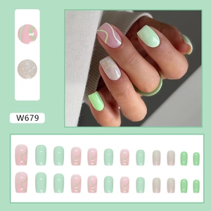 Mint green square press-on nails with wavy patterns, glitter finish, and resin ring set