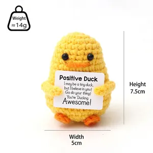 Handmade crochet positive duck plush toy holding motivational card for desk decor