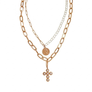 Double-layer rose gold necklace with pearl cross and queen coin pendants on white background