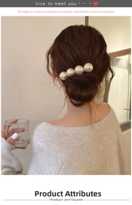 Elegant back view of woman wearing minimalist hair clip with four large white pearls