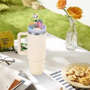 Detailed view of a 40oz tumbler lid with cute 3D miniature cow and house scenery