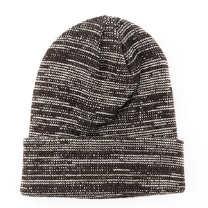 Detailed close-up of brown and white marl knit beanie texture with folded cuff design