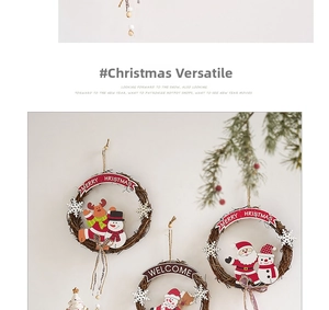 Detail of a rustic Christmas rattan wreath featuring snowman and Santa Claus wood carvings