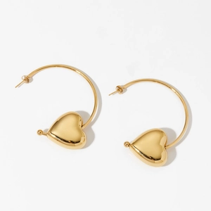 Polished gold plated C-shaped hoop earrings featuring hollow heart-shaped charms