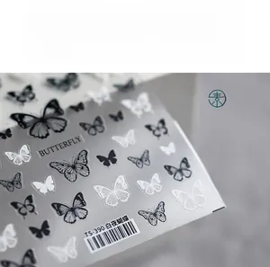 Detail of ultra-thin 5D nail stickers featuring black and white butterfly designs TS-390