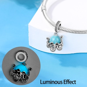 Luminous silver octopus pendant necklace with glowing blue effect on snake chain