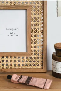 Detail of 5x7 inch wooden picture frame featuring natural octagonal rattan weaving texture