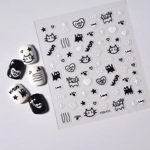 Détail des stickers d'ongles 3D en relief avec motifs de chats en noir et blanc