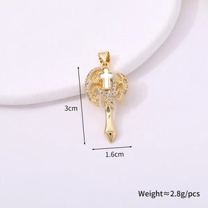 Detail view of a gold cross pendant with clear gemstones showing size 3cm by 1.6cm