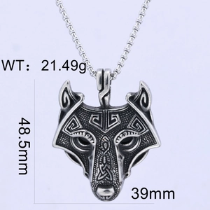 Detailed macro view of vintage silver wolf head pendant with precise size measurements