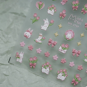 3D embossed nail stickers featuring pink rabbits, tulips, and bows with textured embroidery