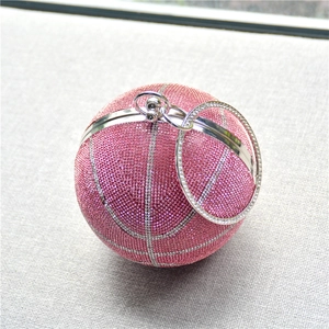 Detailed macro view of pink rhinestones and silver metal hardware on a basketball bag