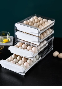 Detailed view of 4-tier stackable plastic egg storage box with transparent drawers