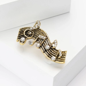 Golden musical note brooch with sparkling rhinestones for suits and coats
