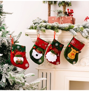 Detail of 4-pack Christmas stockings with 3D Santa, Snowman, Bear and Reindeer characters