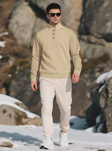 Detail of men's beige stand collar knit sweater with contrast elbow patches and buttons