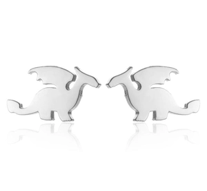 Macro detail of polished stainless steel dragon stud earrings with a mirrored reflection