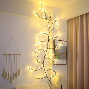 Solar powered rattan branch lights with warm LED glow for cozy indoor wall decoration