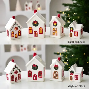 Set of 4 white ceramic Christmas house candle holders with LED lights for festive decor