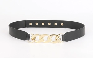 Detail of black leather waist belt with large gold metal chain and snap buttons