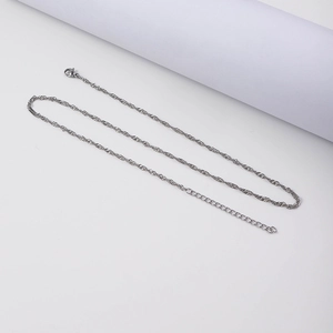 Detail of silver twisted water wave chain necklace with lobster clasp and extender