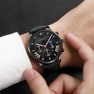 Men's black leather watch with golden hands, chronograph dials, and moon phase display