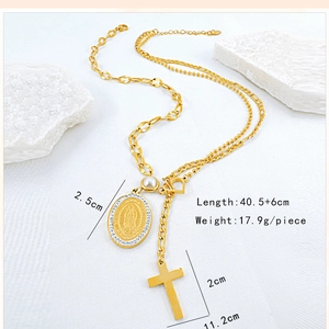 Golden layered necklace with Virgin Mary oval pendant and cross detail on white stone