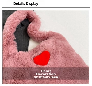 Close-up of soft pink plush handbag featuring a vibrant red heart-shaped embroidery patch