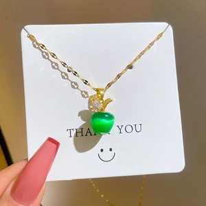 Titanium steel apple pendant necklace with green cat-eye stone and gold wave chain